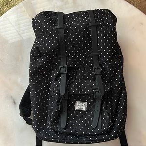 Black and white polka dot backpack